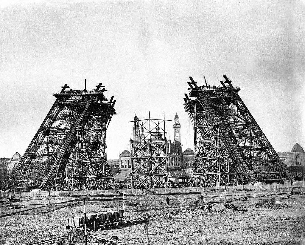 Black-and-white photograph of the Eiffel tower construction